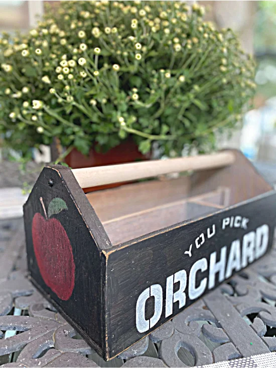 wooden crate and fall mums