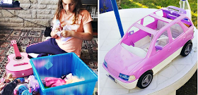My daughter with a box of dolls and a pink Barbie car