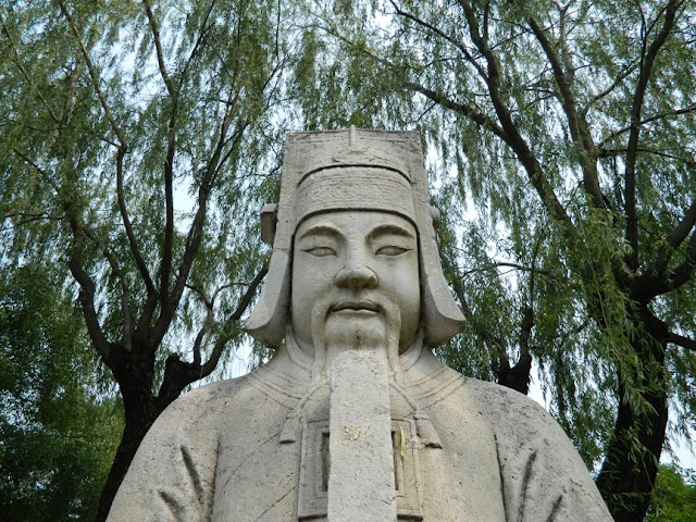 Ming Tombs statue with willows along Sacred Way path by garden muses: a Toronto gardening blog