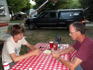 Jim and Nick enjoy a quiet game of Gin at Spruce Row Campground