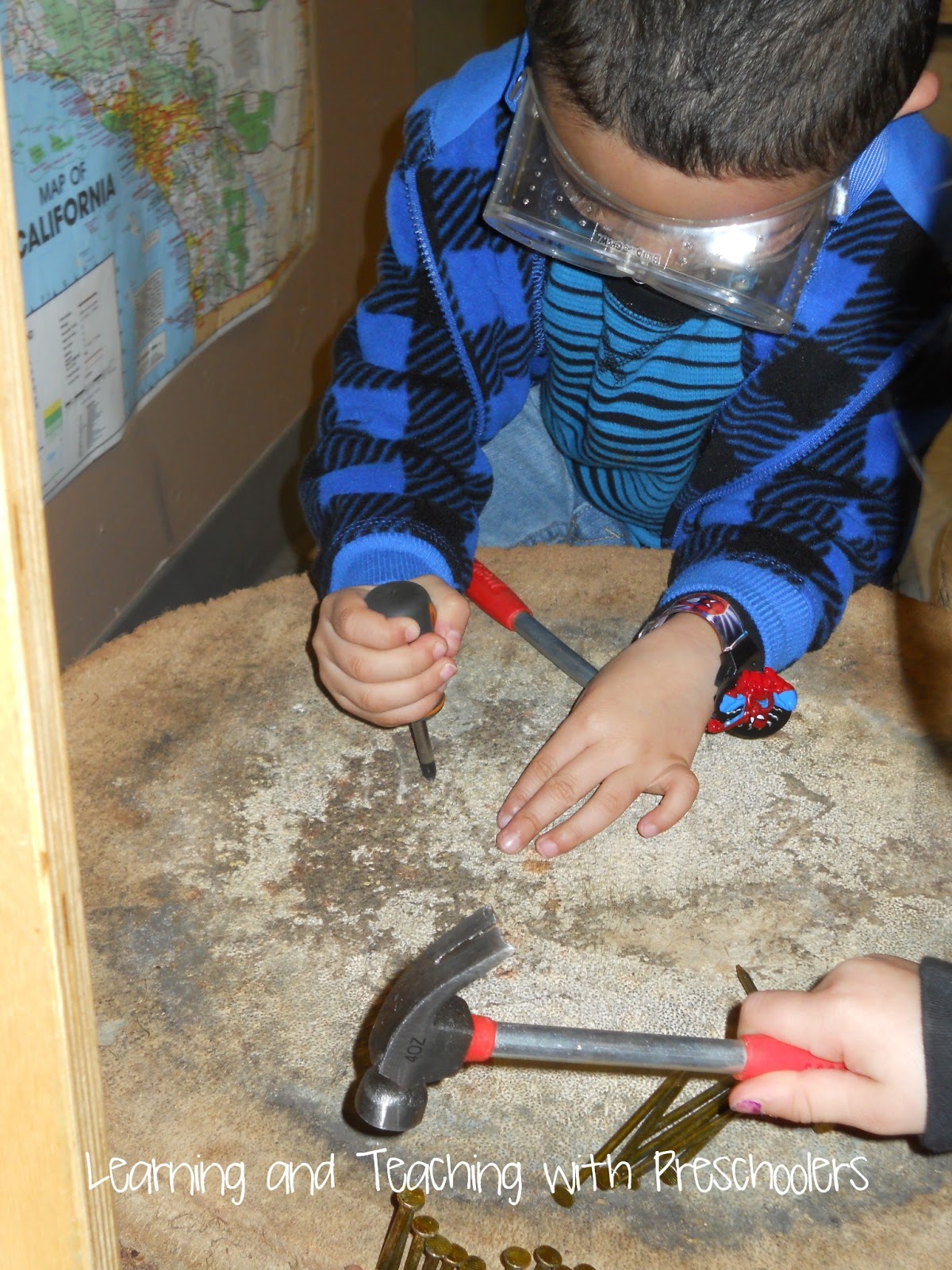 Learning and Teaching With Preschoolers Hammer and Nail Station