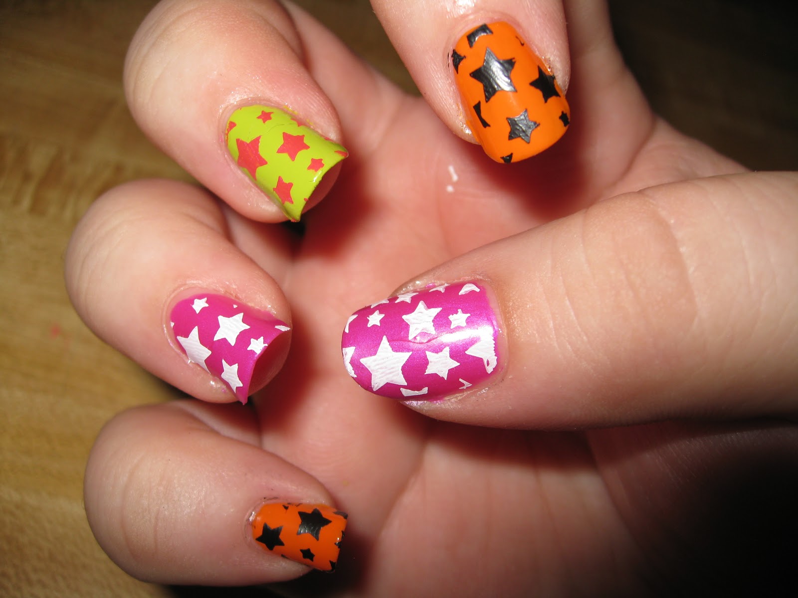 5. "Circus of Horrors: Scary Clown Nail Designs" - wide 7