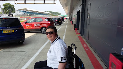 Me in my chair, waiting in the pit lane for a test drive
