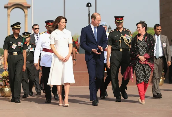 Prince William, Duke of Cambridge and Catherine, Duchess of Cambridge lay a wreath to honour the soldiers from Indian regiments who served in World War I, at India Gate