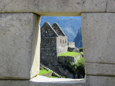 Machu Picchu pictures: Buildings of Machu Picchu viewed through a trapezoidal window