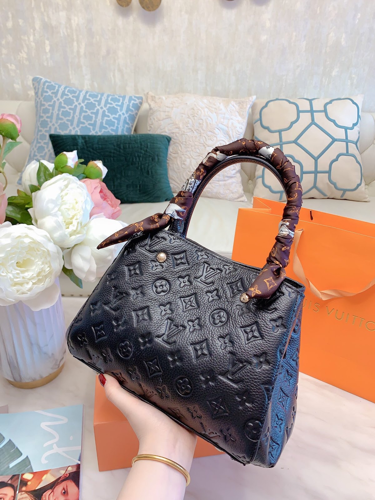 How Much Does A Louis Vuitton Clutch Cost