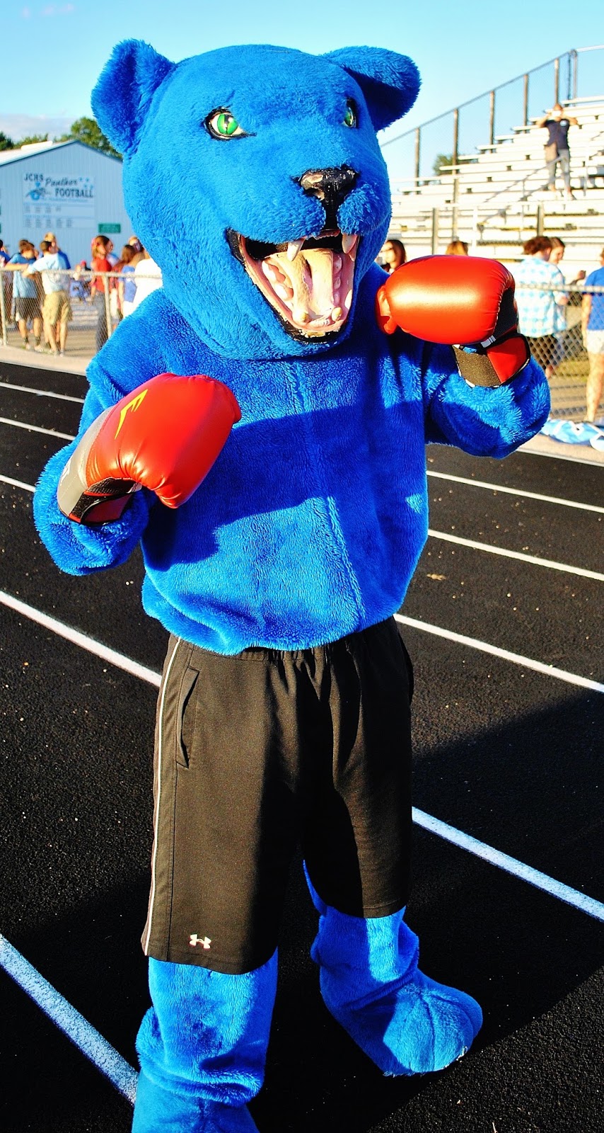 HOME OF THE JERSEY PANTHERS Cheerleaders/Blue Crew/Mascot