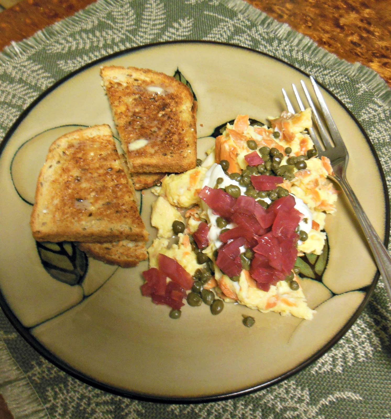 Scrambled Eggs with Smoked Salmon, Sour Cream, Pickled Red Onions and