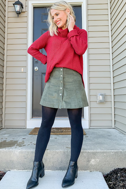 red sweater with green skirt