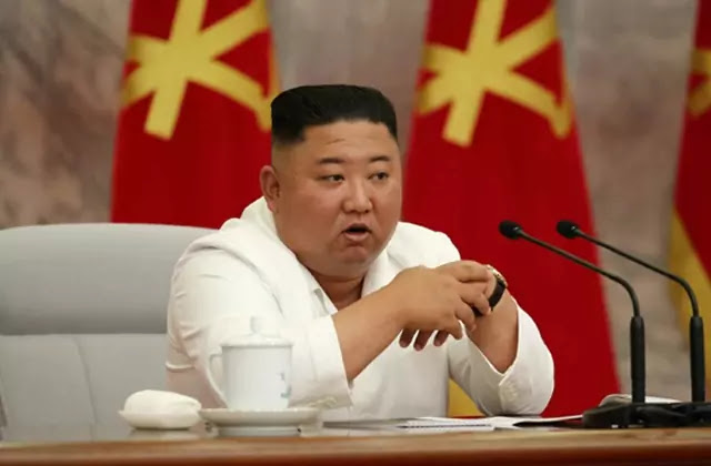 Kim Jong Un at WPK 7th CC 14th Political Bureau Enlarged Meeting