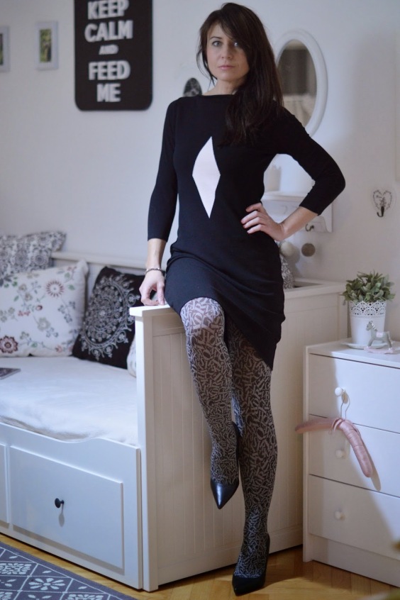 Elegant woman wearing patterned tights