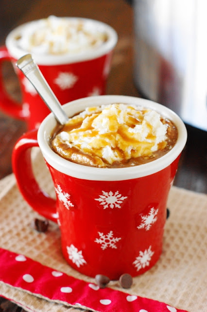 Slow Cooker Caramel Hot Chocolate - with its wonderful flavor & slow cooker ease and convenience, it's the perfect thing to serve for your crowd.  www.thekitchenismyplayground.com