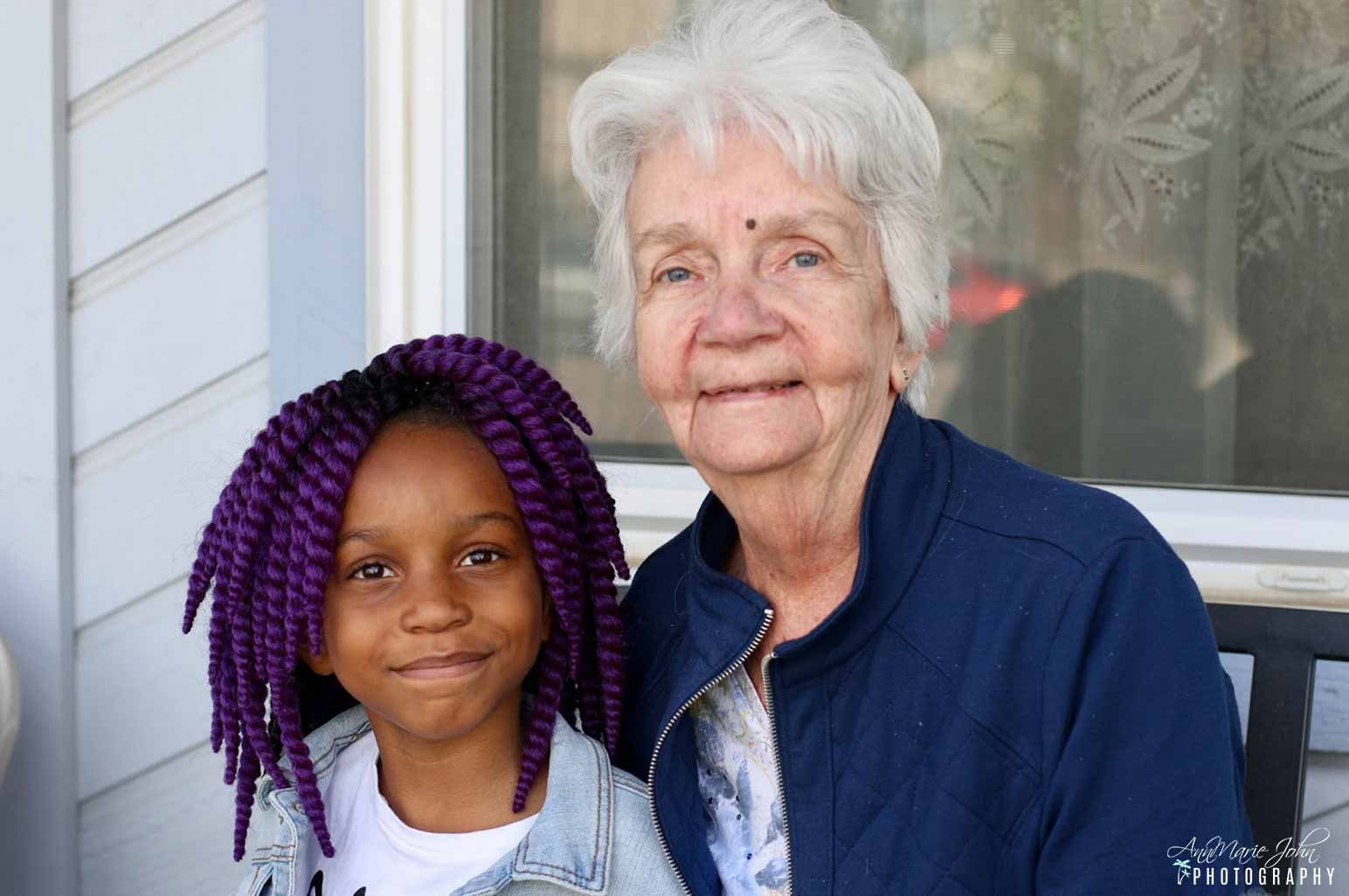 Senior lady and young child