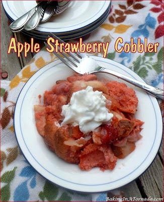 Apple Strawberry Cobbler, fall meets summer. Fresh fruit is baked with a crunchy strawberry cookie topping. | recipe developed by www.BakingInATornado.com | #recipe #dessert