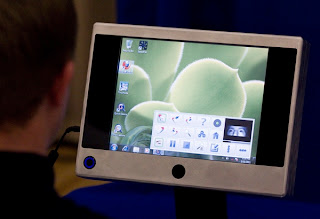 picture of a user in front of the tablet