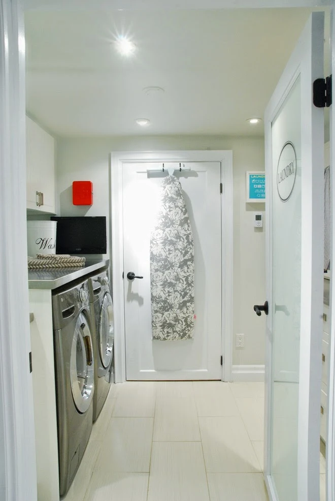 Rambling Renovators | white black laundry room galley