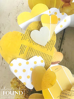 art,wall art,DIY,diy decorating,paper crafts,paper,vintage paper,Valentine's Day,re-purposing,up-cycling,trash to treasure,wreaths,winter,color,color palettes,colorful home,Pantone color of the year,Illuminating Yellow,Ultimate Gray,Pantone 2021,yellow and gray,hearts, heart decor,decorating with hearts,Valentine's Day decor,Valentine hearts,heart wreath,paper hearts, Disney decor, Disneyland tickets