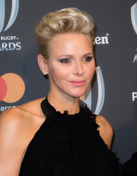 Princess Charlene is wearing her Gucci gown first worn in 2012 at 2017 World Rugby Award ceremony. Dior earrings