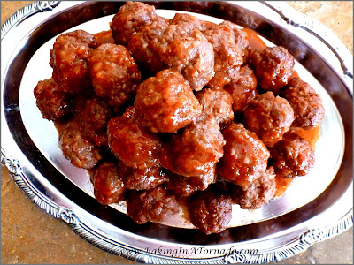 Fruited BBQ Meatballs, Crokpot or Stove Top: These tasty meatballs are so versitile, they can be served as an appetizer or a main course. Recipe includes directions for cooking in the crockpot or on the stove top | Recipe developed by www.BakingInATornado.com | #recipe #dinner #appetizer