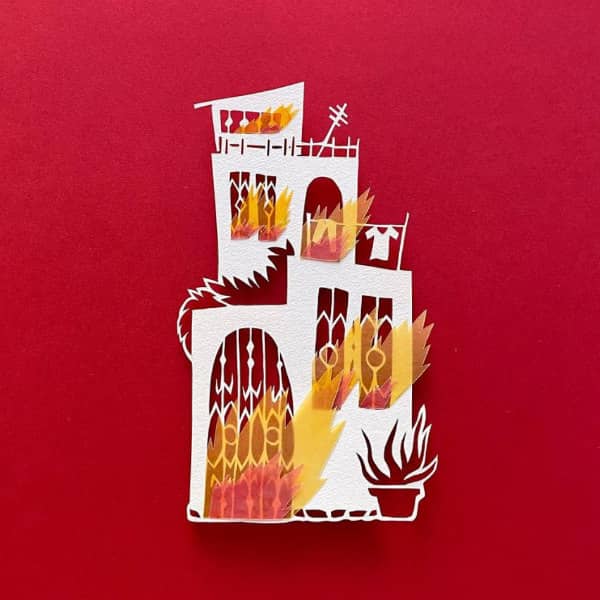 papercut huis met velijn vlammen schieten uit deuren en ramen