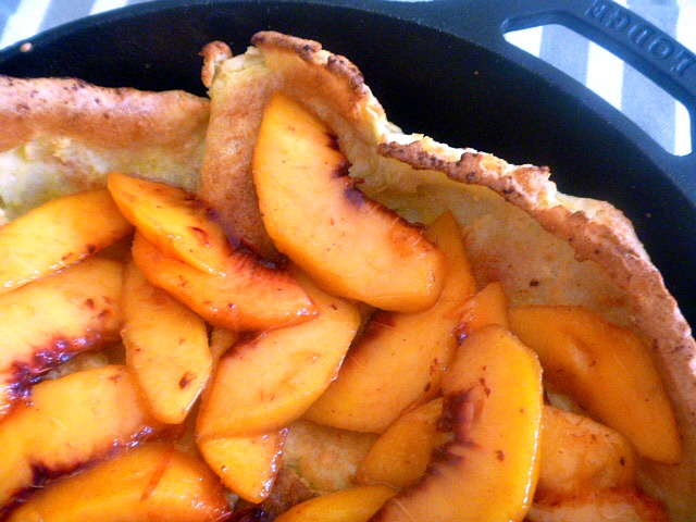 A showstopper presentation is made when you serve this deliciously light and fluffy Dutch Baby filled with juicy ripe peaches at your next breakfast or brunch! - Slice of Southern