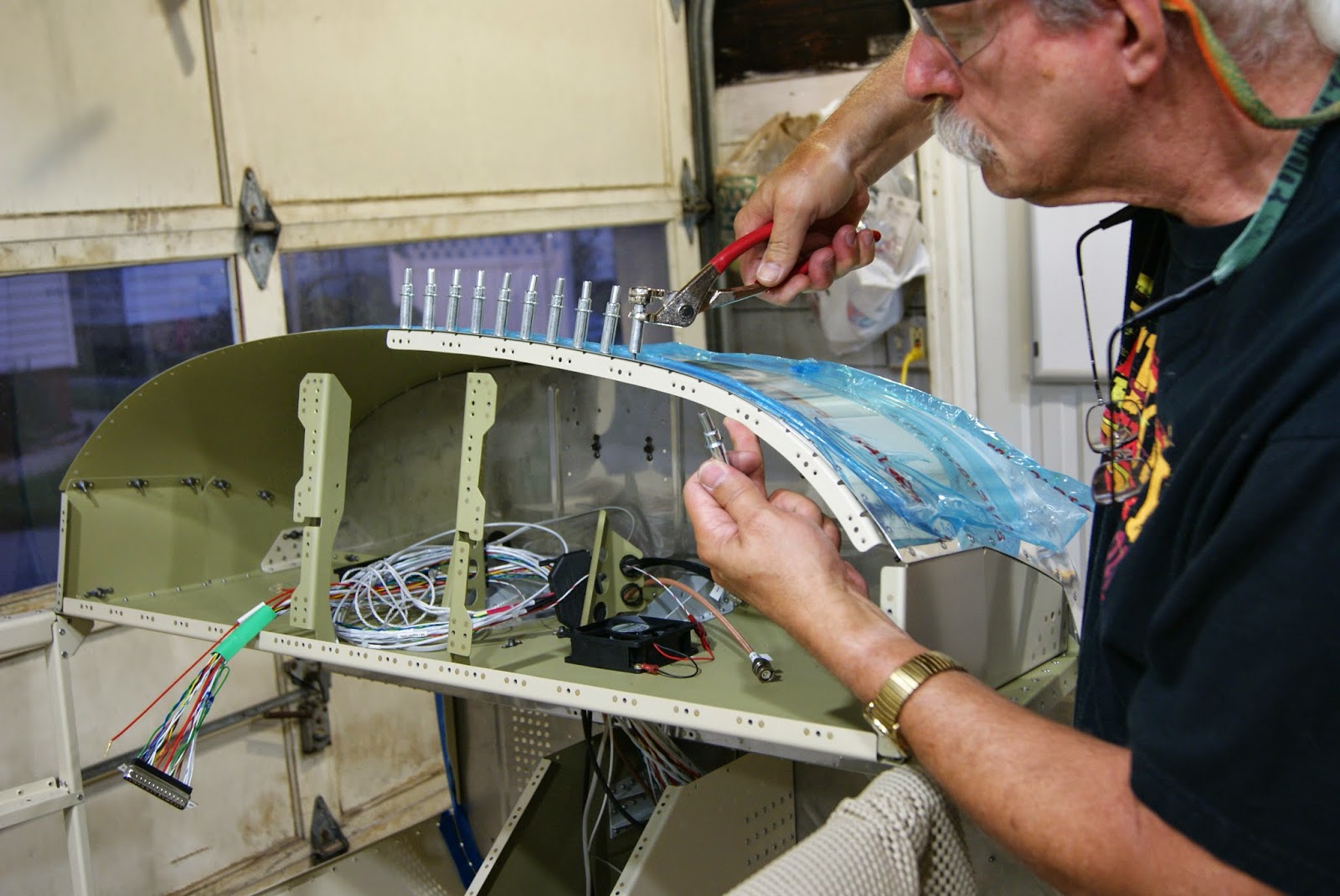 DOG Aviation John's RV-12 Blog: Forward Upper Fuselage Skin Set in Place