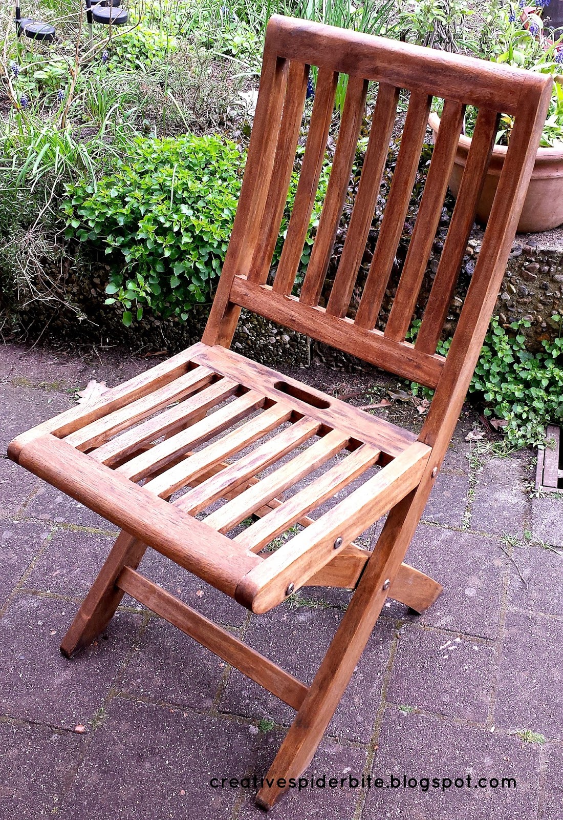 Bitten by that creative Spider refurbish that withered teak wood chair