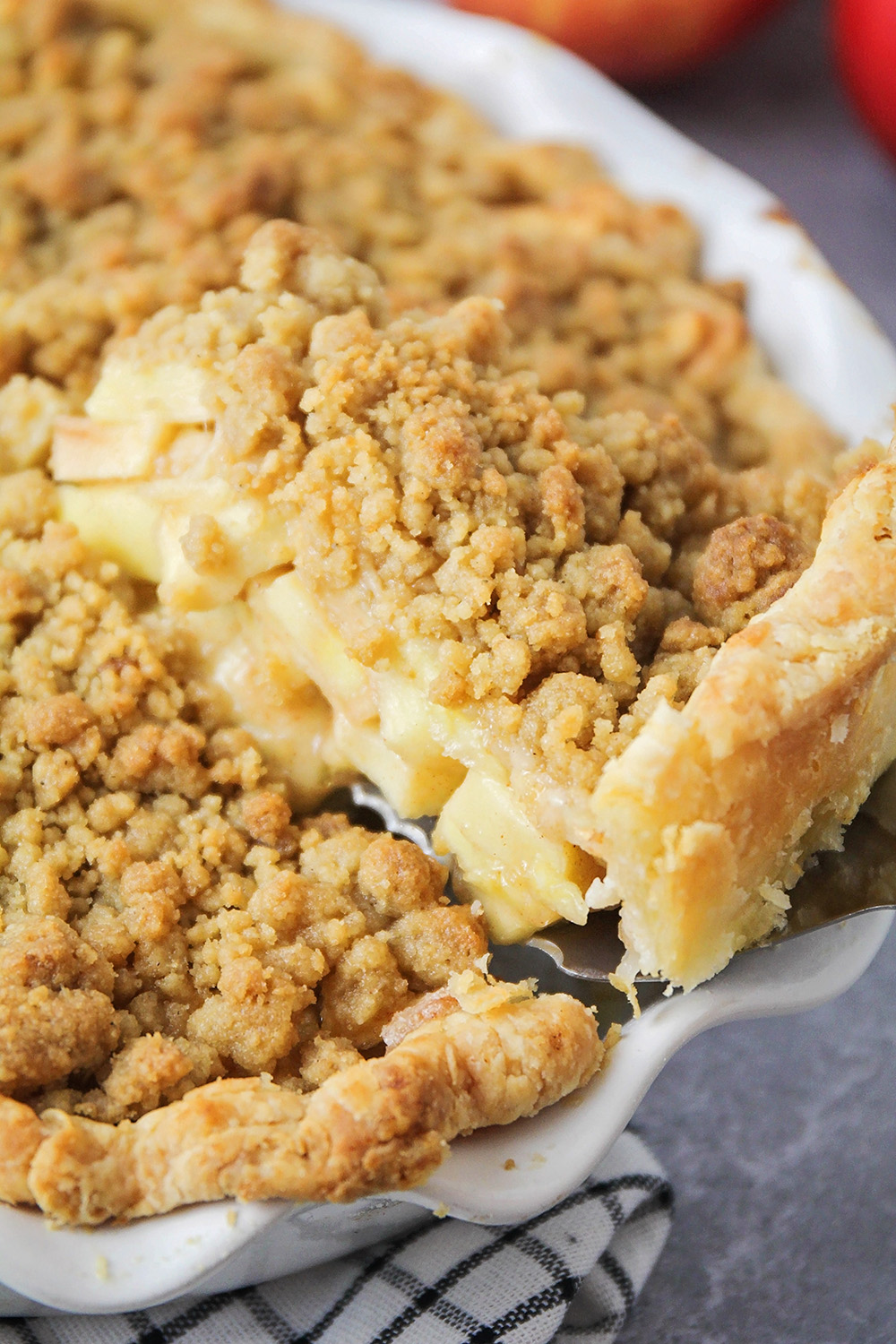 This delicious dutch apple pie is loaded with juicy sweet apples, and topped with an irresistible buttery streusel!