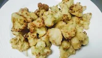 Deep fried Gobi Cauliflower florets for Gobi Manchurian recipe