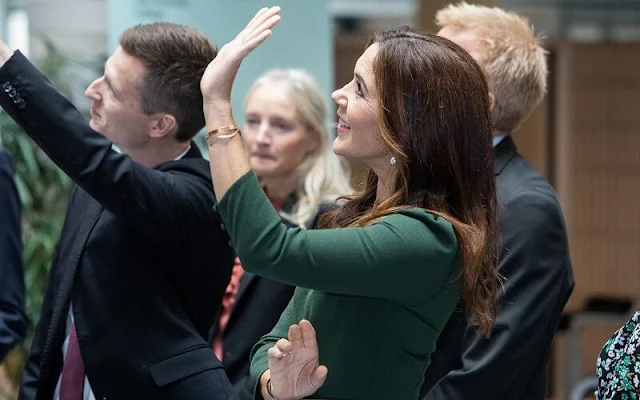 Crown Princess Mary wore a yahvi dress by Beulah. Dulong hook and eye pearl earrings and bracelet, Rebekka Notkin cuff bracelet