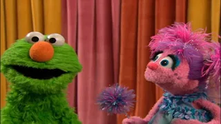 Abby tries to bring Elmo's old color back and she says all magic words but nothing works. Elmo doesn’t want to be green anymore. Sesame Street Being Green