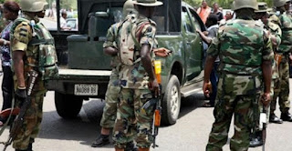 BREAKING: Nigerian Army Seize Corpses Of Peaceful #EndSARS Protesters Massacred By Security Operatives In Lekki