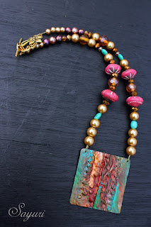 patinaed coper necklace with beads