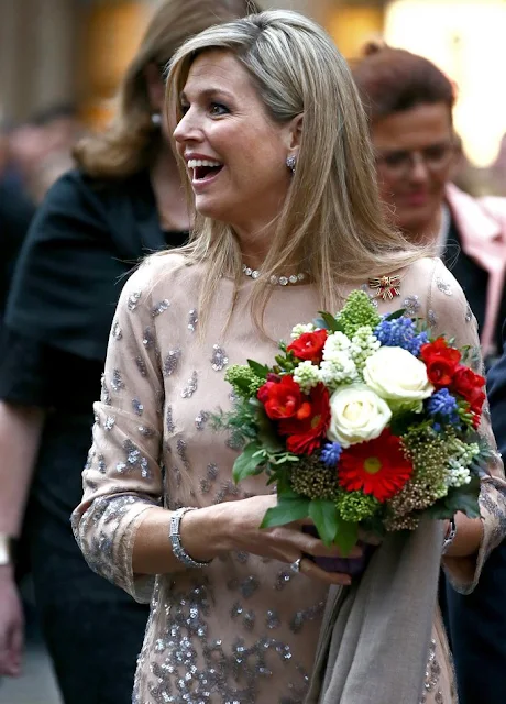 King Willem-Alexander and Queen Maxima of the Netherlands walk across the Marienplatz in Munich, Germany