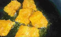 Frying fish in a pan for fish fry recipe