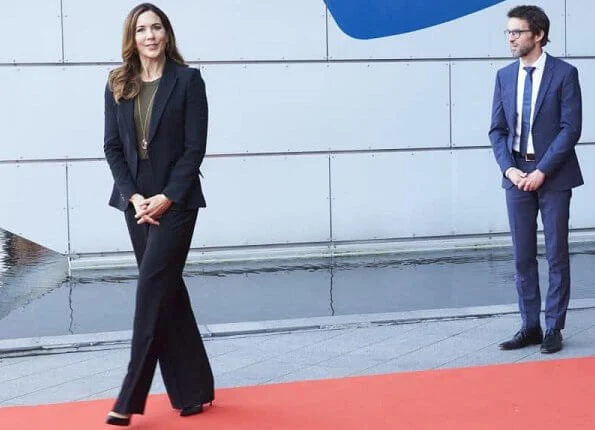 Crown Princess Mary wore a leaf crepe blazer from Alexander McQueen. Alexander McQueen trousers, Gianvito Rossi pumps. gold necklace