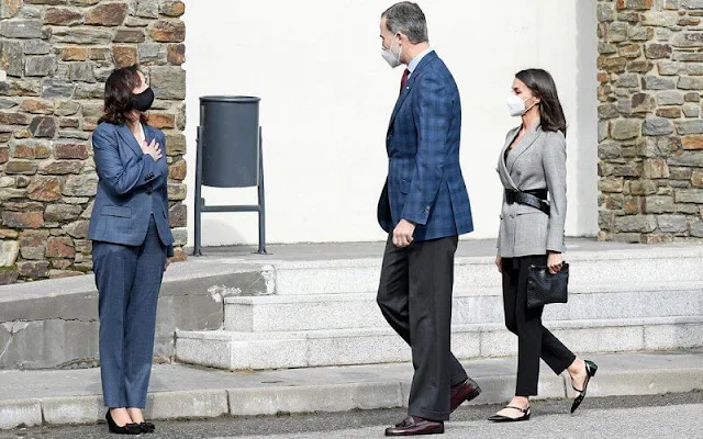 Queen Letizia wore a double breasted glen plaid blazer from Carolina Herrera, and a black lace trim camisole top from Zara