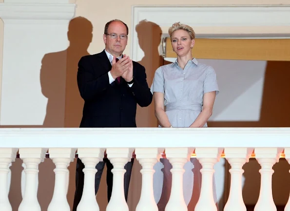 Princess Charlene and Prince Albert of Monaco watched the traditional celebrations of St. John's Day procession (Fête de la Saint-Jean) at Palace Square in Monaco