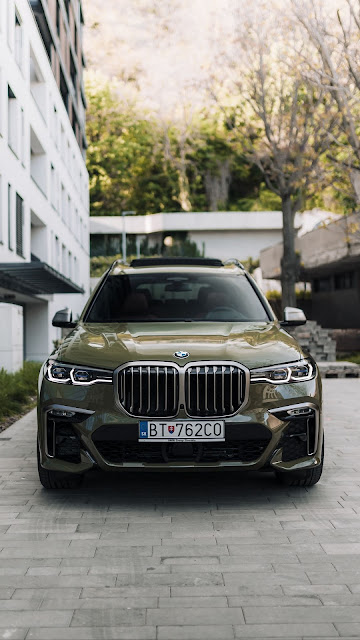 Wallpaper with green BMW luxury car