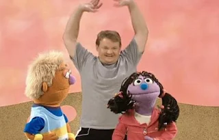 Andy Ritcher demonstrates methods of moving our body. Sesame Street Happy Healthy Monsters