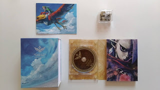the inner set with the booklet, music box and a unfolded sheeth that has the CDs and an artwork of Ghirahim on it
