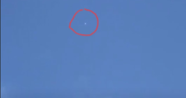 The UFO here is so far away and hard to see until you zoom into it.