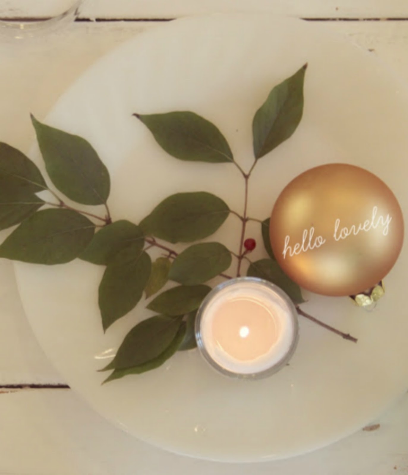 Romantic shabby chic French farmhouse tablescape on white farm table with roses by Hello Lovely Studio