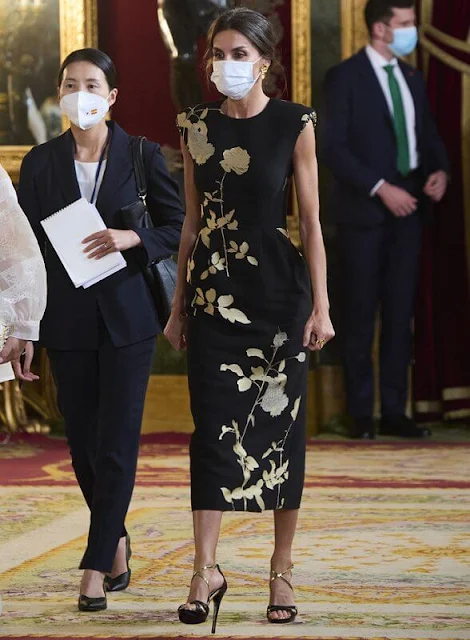 Queen Letizia wore a sequin embellished metallic floral print jacquard midi dress from Dries van Noten. First Lady Kim Jung-sook