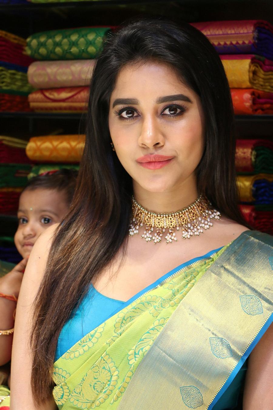 Glamorous Indian Model Nabha Natesh In Green Saree At Shopping Mall Launch Tollywood Boost 