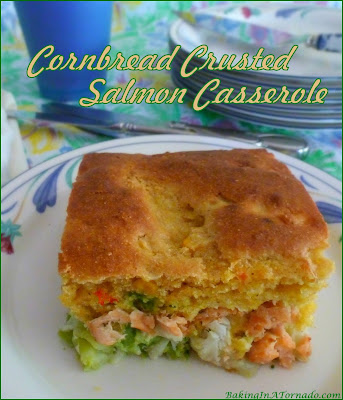 Cornbread Crusted Salmon Casserole, vegetables and salmon fillets topped with a cornbread crust and baked together for a healthy dinner. | Recipe developed by www.BakingInATornado.com | #recipe #dinner