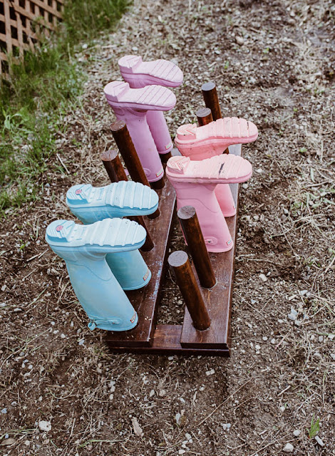 overhead view of tree stand with colorful boots