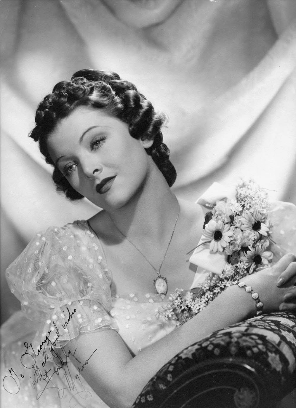 Myrna Loy  The Epitome of Classic Hollywood Charm Through Old Photos - 43