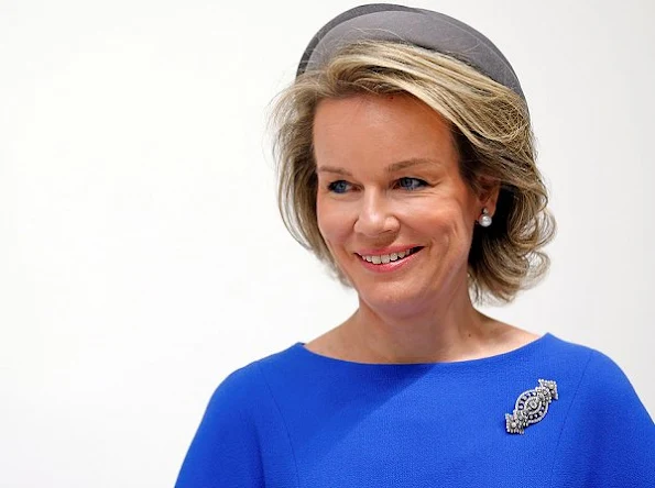 Queen Mathilde style new season dress coat trench coat diamond gold earrings jewellery wore blue dress