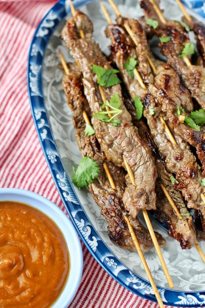 Beef satay on skewers with peanut dipping sauce